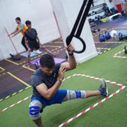 A men doing stretching in Gym